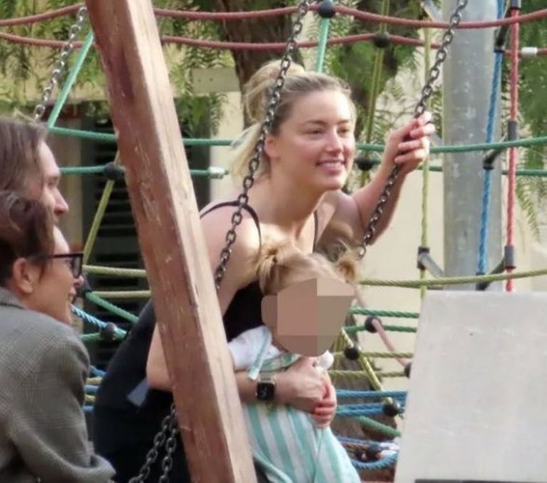Amber Heard aparece en público con su nueva pareja por primera vez (FOTOS)