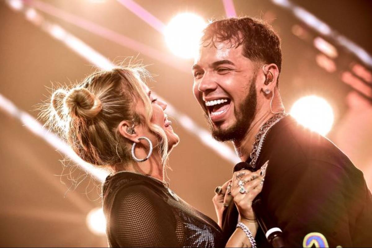 Gooey Couple Things in Secreto Video by Anuel AA and Karol G Review   Justrandomthings