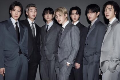 Los miembros de BTS se unen para intentar desvestir a V durante un concierto